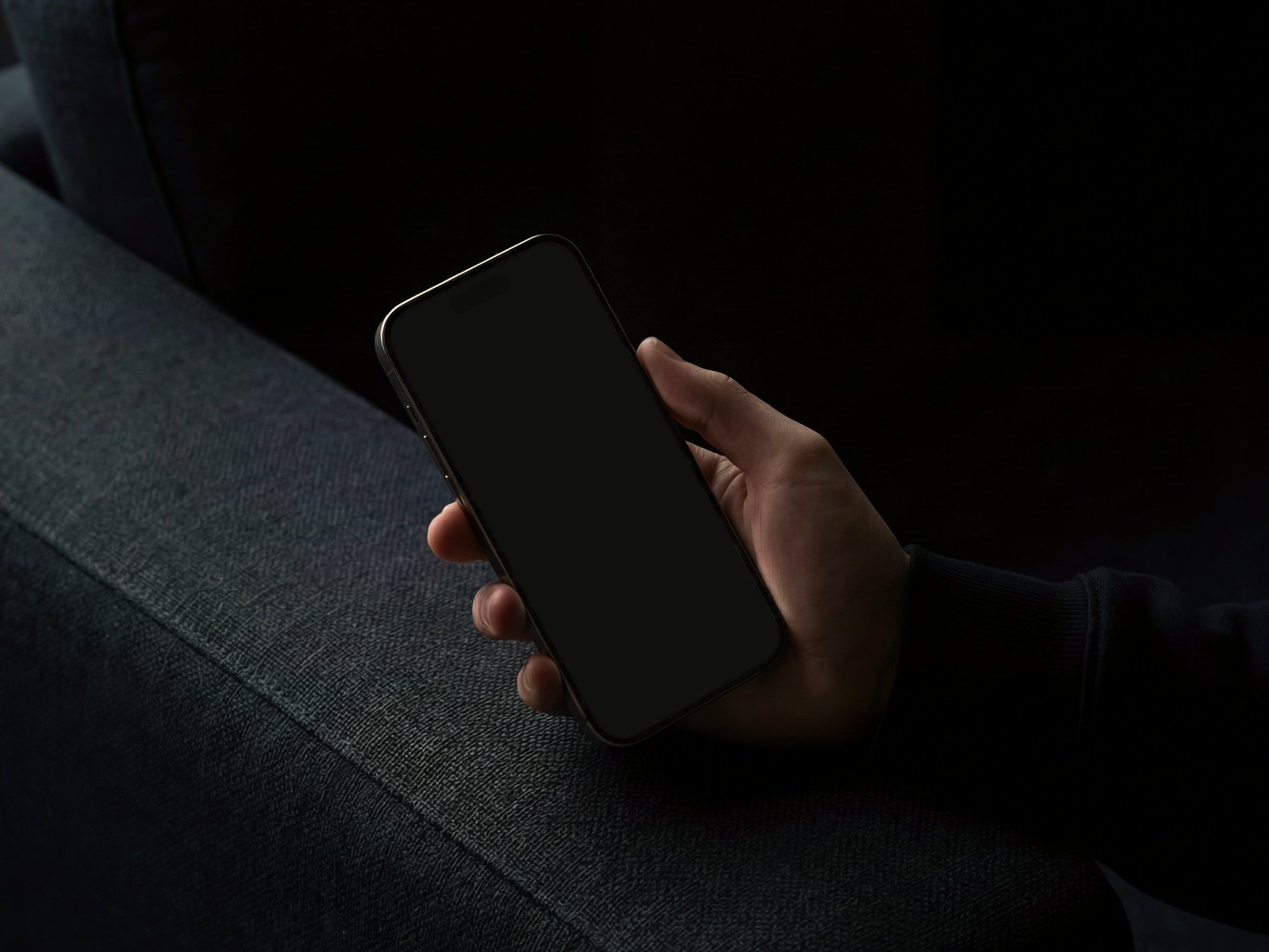 A hand holding a phone showing Trips in the Mercury app